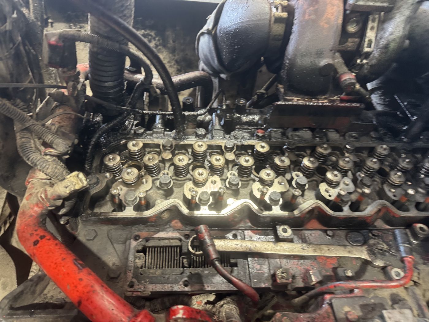 Construction equipment diesel engine with the valve cover removed